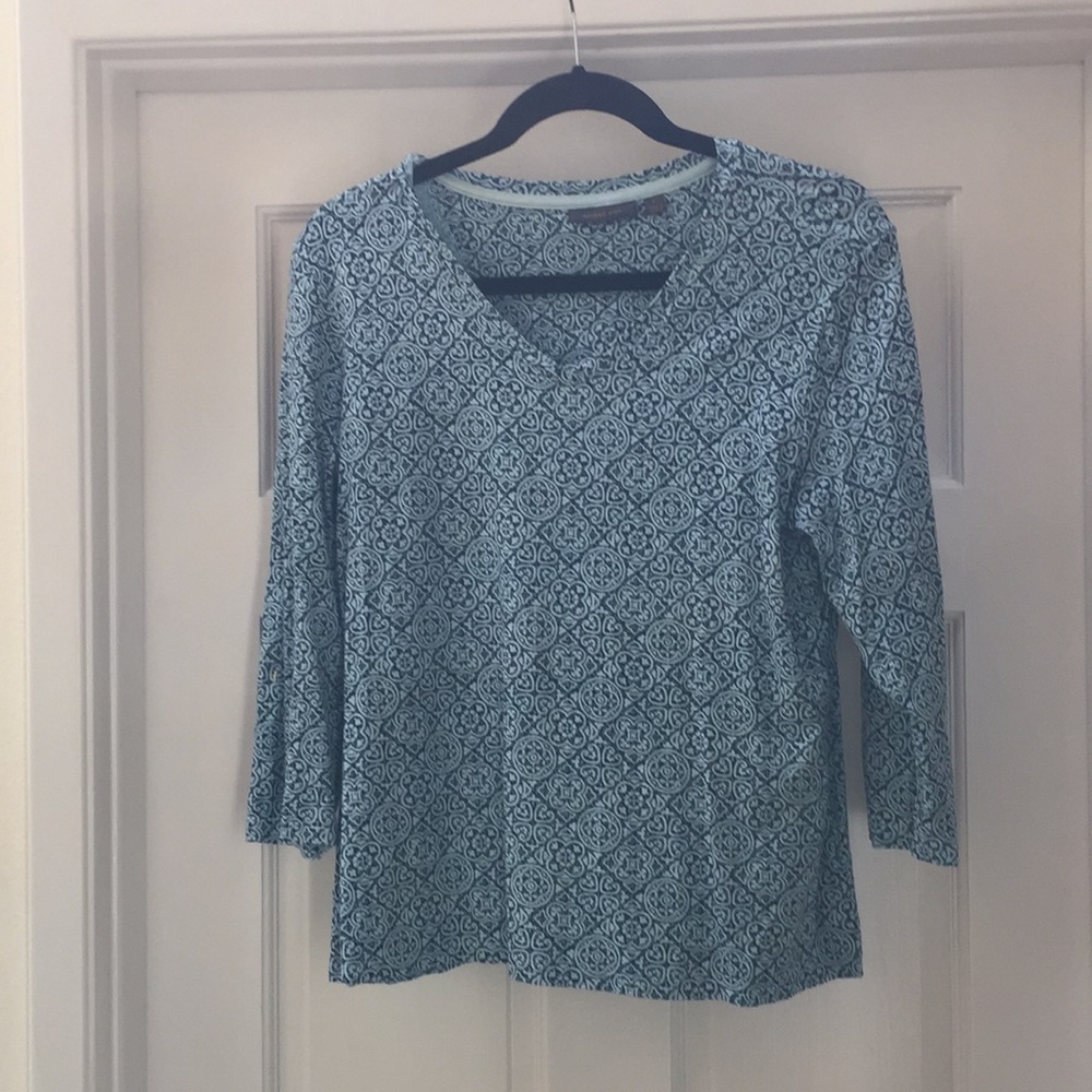 Patterned top flatters you in shades of blue